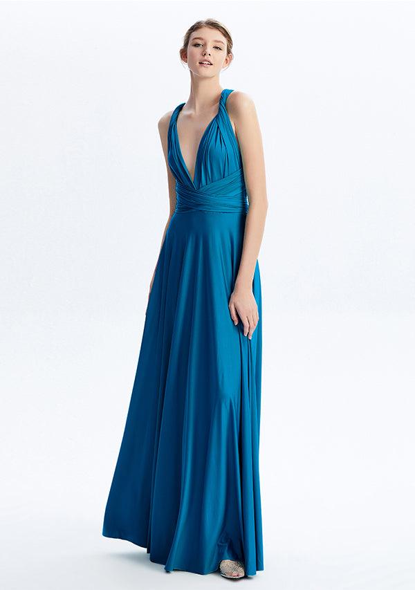 infinity dress teal blue Ocean vibes and bridesmaid squad goals! Loving these seaside bridesmaid photos with various shades of blue gowns. From turquoise to teal blue, each color complements the sea perfectly. #BridesmaidGoals #SeasideChic #BlueHues